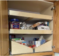 Overhead storage cabinets in the kitchen.