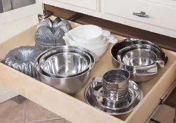 Pots and pans in a drawer.