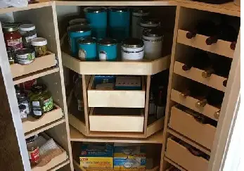 Corner pantry full of items.