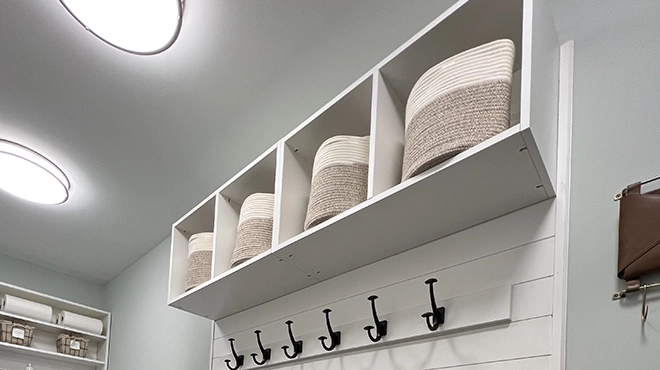 Shelving above a laundry room.