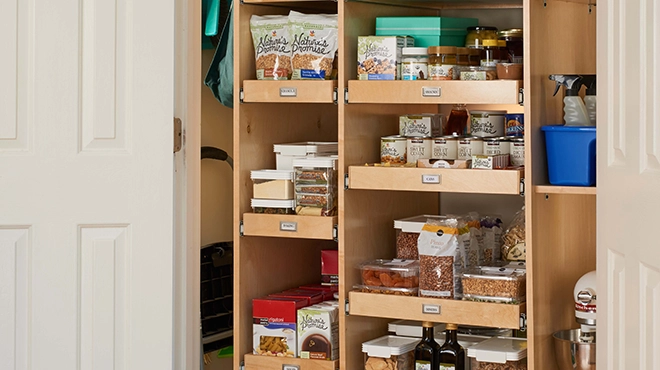 Double-door pantry with fully extended Pull-Out Shelves.