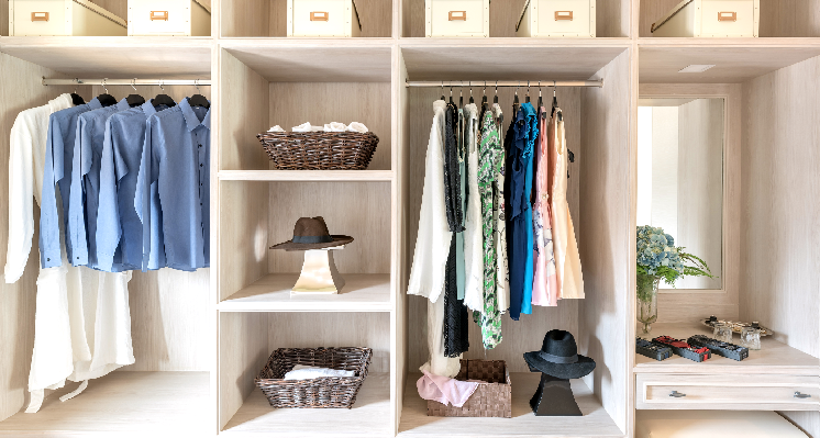 Closet with white shelves.