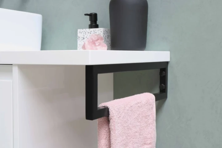 towel hanging under counter