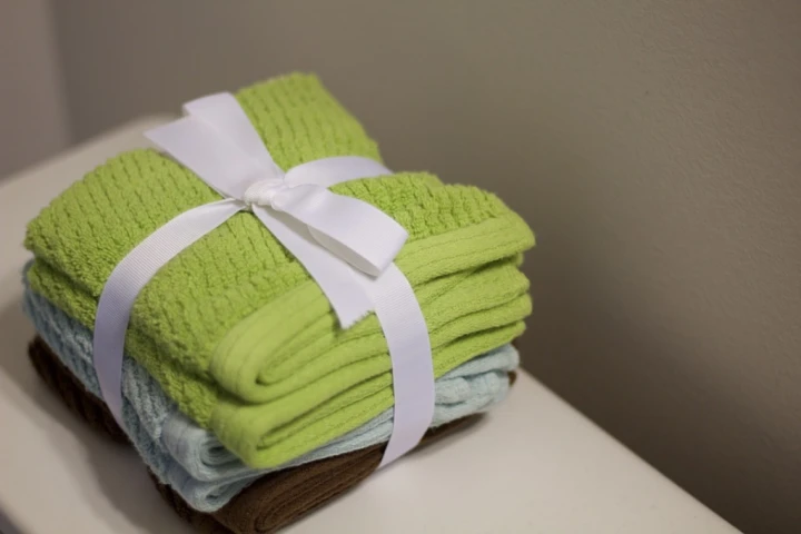 folded towels bound with ribbon