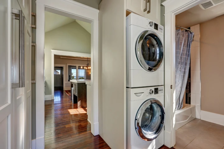 A stacked washing machine and dryer can save a ton of space.