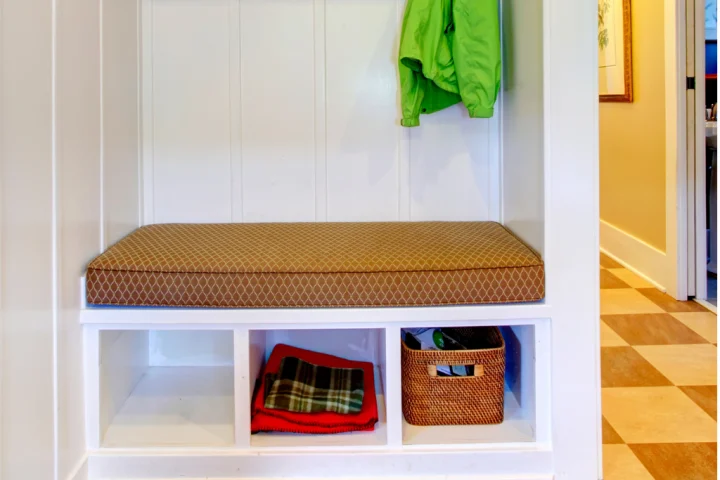 A storage bench, whether built-in or purchased separately, is a beautiful option.