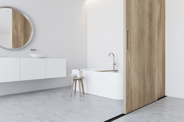 A sliding door helps small bathrooms feel bigger for small bathroom remodel ideas.