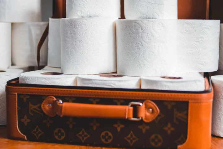 A suitcase full of toilet paper.