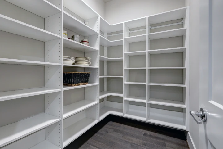 a white shelves in a room.