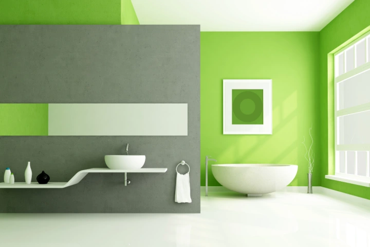 Green walls with a basin sink and a floating shelf vanity. 