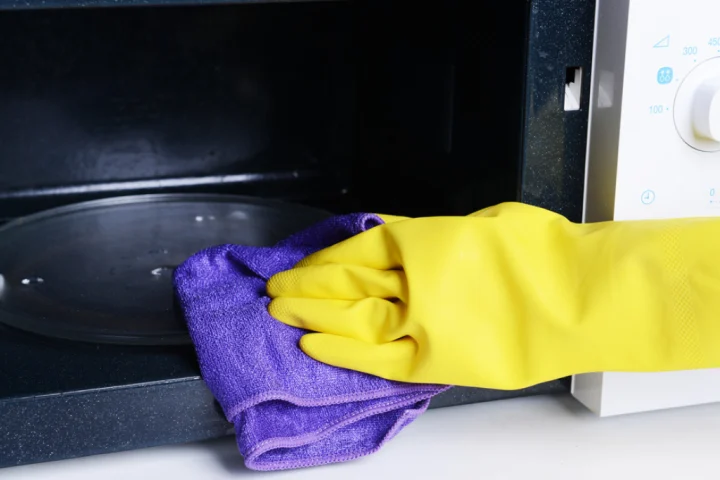 Microwave cleaning, rubber gloves, cleaning cloth.