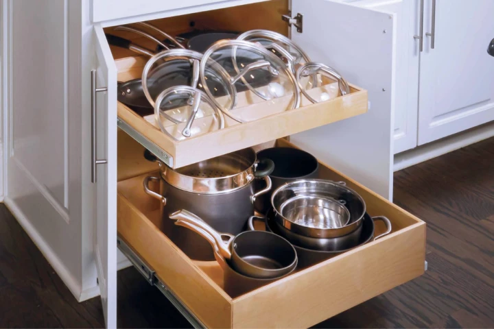 Glide-out shelves, pots and pans storage.