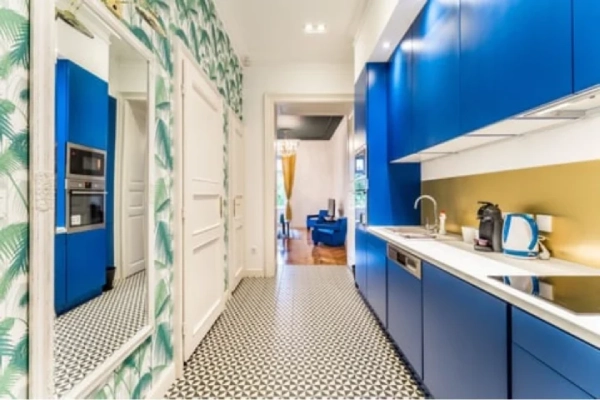 Bright blue kitchen.