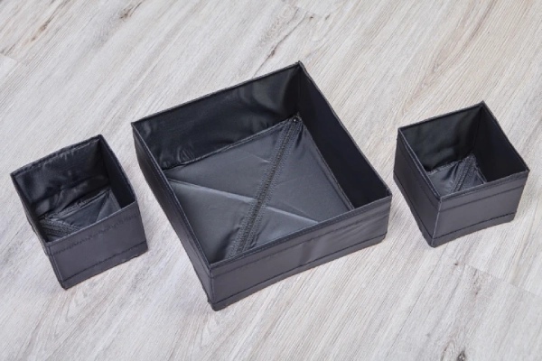 Foldable black box organizer.