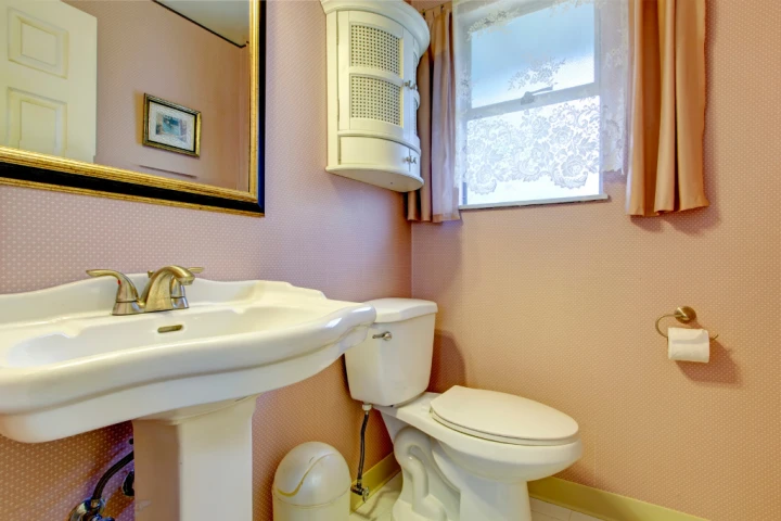 Peach bathroom with polka dots powder room ideas.
