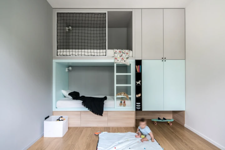 Bunk beds and cabinets as part of kids closet ideas.