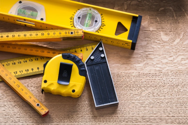 A yellow measuring tape and ruler.