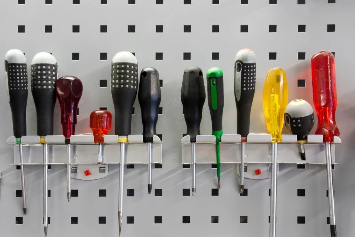 A pegboard is a super simple DIY way of keeping your tools organized. 