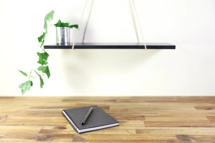 Floating shelves are decorative and functional, and can hold anything within weight limit.