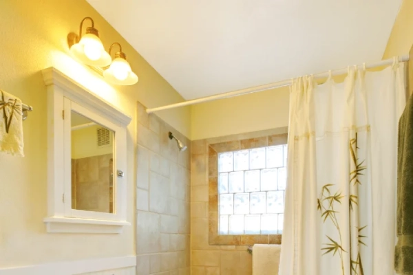 The light is reflected in the mirror for more effect for small bathroom remodel ideas.