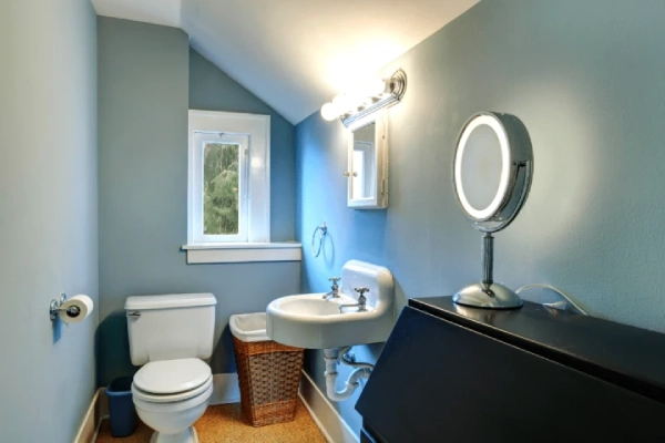 This room doesn’t feel as cramped as it is because of the illusion of height for small bathroom remodel ideas.